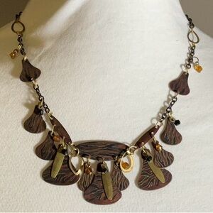Artisan Dark Gold Toned Metal Necklace ?Black & Orange Beads Patterned Charms